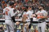 Baltimore Orioles' Trey Mancini, left, celebrates scoring a run on Ryan Mountcastle's two-run double with Cedric Mullins (31) and DJ Stewart during the first inning of a baseball game against the Houston Astros, Wednesday, June 30, 2021, in Houston. (AP Photo/Eric Christian Smith)