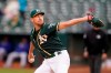 Oakland Athletics' Chris Bassitt pitches against the Texas Rangers during the first inning of a baseball game in Oakland, Calif., Wednesday, June 30, 2021. (AP Photo/Jeff Chiu)