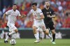 Spain's Pedri runs with the ball during the Euro 2020 soccer championship round of 16 match between Croatia and Spain at the Parken Stadium in Copenhagen, Monday June 28, 2021. (Stuart Franklin, Pool Photo via AP)