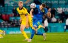 Ukraine's Artem Dovbyk, right, scores his side's second goal during the Euro 2020 soccer championship round of 16 match between Sweden and Ukraine at the Hampden Park Stadium in Glasgow, Tuesday, June 29, 2021. (AP Photo/Petr David Josek, Pool)