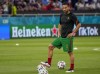 Portugal's Andre Silva warms up ahead of the Euro 2020 soccer championship group F match between Portugal and France at the Puskas Arena, Budapest, Hungary, Wednesday, June 23, 2021. (AP Photo/Darko Bandic,Pool)