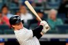 New York Yankees Clint Frazier hits a two-run double during the fourth inning of a baseball game against the Kansas City Royals, Wednesday, June 23, 2021, at Yankee Stadium in New York. (AP Photo/Kathy Willens)