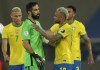 Brazil's Neymar, right, and Chile's goalkeeper Claudio Bravo greet each other at the end of a Copa America quarterfinal soccer match at the Nilton Santos stadium in Rio de Janeiro, Brazil, Friday, July 2, 2021. Chile lost to Brazil 0-1. (AP Photo/Silvia Izquierdo)