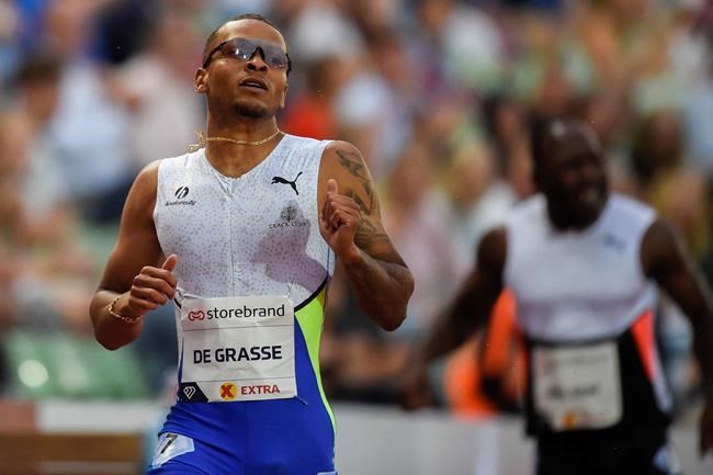 André De Grasse, of Canada, wins the men's 200m at the Diamond League meeting in Oslo, Norway, Thursday, July 1, 2021. De Grasse had to train on a soccer field for weeks after his track in Florida closed for COVID-19 protocols. THE CANADIAN PRESS/AP-NTB, Annika Byrd