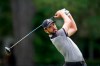 Troy Merritt drives off the fourth tee during the third round of the Rocket Mortgage Classic golf tournament, Saturday, July 3, 2021, at the Detroit Golf Club in Detroit. (AP Photo/Carlos Osorio)