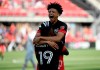 D.C. United's Kevin Paredes, rear, celebrates with Nigel Robertha after Robertha scored against Toronto FC during the first half of an MLS soccer match Saturday, July 3, 2021, in Washington. (Will Newton/The Washington Post via AP)