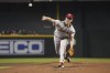 San Francisco Giants pitcher Anthony DeSclafani throws against the Arizona Diamondbacks in the first inning of a baseball game, Sunday, July 4, 2021, in Phoenix. (AP Photo/Rick Scuteri)