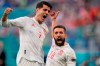 Spain's Jordi Alba celebrates with Alvaro Morata, left, after scoring the opening goal during the Euro 2020 soccer championship quarterfinal match between Switzerland and Spain at Saint Petersburg stadium in St. Petersburg, Russia, Friday, July 2, 2021. (AP Photo/Dmitri Lovetsky, Pool)
