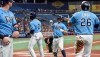 From left to right, Tampa Bay Rays' Mike Zunino, Yandy Diaz (2), Brandon Lowe and Ji-Man Choi (26) celebrate after Lowe's grand slam off Cleveland Indians starter Logan Allen during the second inning of a baseball game Monday, July 5, 2021, in St. Petersburg, Fla. (AP Photo/Steve Nesius)