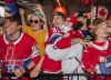Montreal Canadiens fans celebrate after Canadiens' Josh Anderson, not shown, scored the game-winning goal during overtime Game 4 Stanley Cup finals action against the Tampa Bay Lightning, in Montreal, Monday, July 5, 2021. THE CANADIAN PRESS/Ryan Remiorz