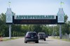 Visitors arrive at the Adventureland Park amusement park, Tuesday, July 6, 2021, in Altoona, Iowa. The father of an 11-year-old boy who died following an accident on the popular boat ride at the park said that his son and other family members were trapped by the ride's seat belts when the boat carrying them flipped. (AP Photo/Charlie Neibergall)