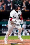Chicago White Sox's Yasmani Grandal watches after hitting a three-run home run during the fifth inning of a baseball game against the Minnesota Twins in Chicago, Wednesday, June 30, 2021. (AP Photo/Nam Y. Huh)
