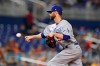 Los Angeles Dodgers Jake Reed pitches during the sixth inning of the team's baseball game against the Miami Marlins, Tuesday, July 6, 2021, in Miami. Reed made his major league debut as his wife Janie Reed prepares to play outfield for the U.S. softball team at the Olympics. The Marlins won 2-1 in 10 innings. (AP Photo/Wilfredo Lee)