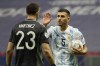 Argentina's Leandro Paredes celebrates with goalkeeper Emiliano Martinez after scoring against Colombia during a penalty shootout during a Copa America semifinal soccer match at the National stadium in Brasilia, Brazil, Wednesday, July 7, 2021. (AP Photo/Andre Penner)