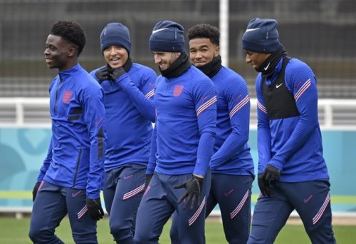 England's Bukayo Saka, Jadon Sancho, Ben Chilwell, Reece James and Markus Rashford, from left, arrive for a training session at St George's Park, Burton upon Trent, England, Tuesday July 6, 2021, ahead of their Euro 2020 soccer championship semifinal match against Denmark in London on Wednesday. (AP Photo/Rui Vieira)