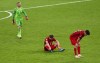 Denmark players react following their loss to England in their Euro 2020 soccer championship semifinal at Wembley stadium in London, Wednesday, July 7, 2021. (Justin Tallis/Pool Photo via AP)