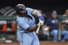 Toronto Blue Jays' Vladimir Guerrero Jr. connects for a single against the Baltimore Orioles during the third inning of a baseball game, Wednesday, July 7, 2021, in Baltimore. (AP Photo/Julio Cortez)