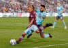 Colorado Rapids forward Michael Barrios, front, uncorks a shot on the net as Minnesota United's D.J. Taylor defends during the second half of an MLS soccer match Wednesday, July 7, 2021, in Commerce City, Colo. (AP Photo/David Zalubowski)
