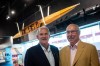 George Hungerford, left, and Roger Jackson, who were rowing gold medallists at the 1964 Olympics in Tokyo, pose for a photograph as their rowing shell from those games hangs behind them at the B.C. Sports Hall of Fame, in Vancouver, on Friday July 26, 2019. THE CANADIAN PRESS/Darryl Dyck