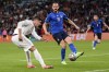 Spain's Alvaro Morata kicks the ball as Italy's Leonardo Bonucci stops it during the Euro 2020 soccer semifinal match between Italy and Spain at Wembley stadium in London, Tuesday, July 6, 2021. (Laurence Griffiths, Pool via AP)