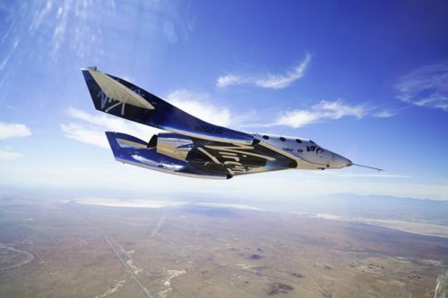This May 29, 2018 photo made available by Virgin Galactic shows the company's VSS Unity on its second supersonic flight. After reaching nearly 50,000 feet (15,000 meters), Unity will be released from the specially designed aircraft Mothership Eve, and drop for a moment or two before its rocket motor ignites to send the craft on a steep climb toward space. (Virgin Galactic via AP)
