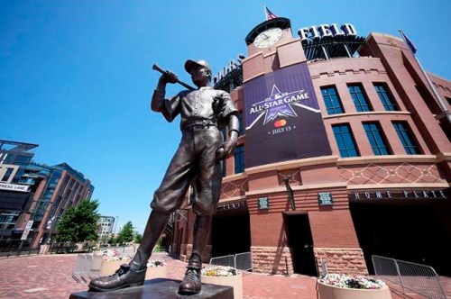 A banner for the All-Star game hangs on the front of Coors Field near the sculpture entitled 