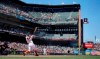 San Francisco Giants' Brandon Crawford, second from left, hits a solo home run against the Washington Nationals during the sixth inning of a baseball game Saturday, July 10, 2021, in San Francisco. (AP Photo/Tony Avelar)