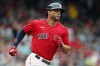 Boston Red Sox's Xander Bogaerts rounds the bases on his solo home run during the second inning of a baseball game, Saturday against the Philadelphia Phillies, July 10, 2021, in Boston. (AP Photo/Michael Dwyer)