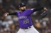 Colorado Rockies starting pitcher German Marquez winds up during the third inning of the team's baseball game against the San Diego Padres, Saturday, July 10, 2021, in San Diego. (AP Photo/Derrick Tuskan)