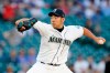 Seattle Mariners starting pitcher Yusei Kikuchi throws to a New York Yankees batter during the second inning of a baseball game Wednesday, July 7, 2021, in Seattle. (AP Photo/Elaine Thompson)