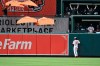 Baltimore Orioles center fielder Cedric Mullins hits the wall after chasing down a three run home run by Chicago White Sox Adam Engel In the 10th inning of a baseball game, July 11, 2021 in Baltimore. (AP Photo/Gail Burton)