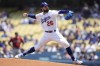 Los Angeles Dodgers starting pitcher Tony Gonsolin (26) throws during the first inning of a baseball game against the Arizona Diamondbacks Sunday, July 11, 2021, in Los Angeles. (AP Photo/Ashley Landis)