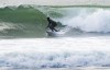Canadian surfer Mathea Olin rides a wave during a surf session in Jordan River, B.C., Wednesday, Dec. 9, 2020. Surfing is one of four sports that will make its Olympic debut at the Tokyo Games. THE CANADIAN PRESS/Jonathan Hayward
