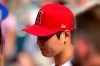 American League's Shohei Ohtani, of the Los Angeles Angeles, watches warms-up during batting practice for the MLB All-Star baseball game, Monday, July 12, 2021, in Denver. (AP Photo/Gabriel Christus)
