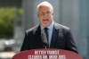 Premier John Horgan talks about the transit announcement at Surrey City Hall in Surrey, B.C., on Friday, July 9, 2021. THE CANADIAN PRESS/Chad Hipolito