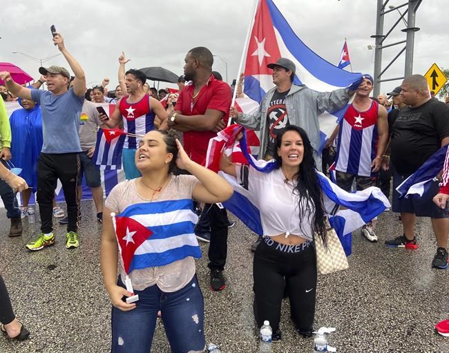 Cuban Americans demonstrators shut down part of Palmetto Expressway Tuesday, July 13, 2021, to voice their support for the people in Cuba and calling for attention to the Biden administration to carry out a humanitarian intervention on the island. (Pedro Portal/Miami Herald via AP)