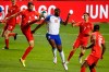 Canada's Steven Vitoria (5) kicks the ball next to Haiti's Frantzdy Pierrot (20) during the second half of a World Cup qualifying soccer match Tuesday, June 15, 2021, in Bridgeview, Ill. THE CANADIAN PRESS/AP-Kamil Krzaczynski