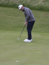 South Africa's Louis Oosthuizen putts on the 6th green during a practice round for the British Open Golf Championship at Royal St George's golf course Sandwich, England, Wednesday, July 14, 2021. The Open starts Thursday, July, 15. (AP Photo/Ian Walton)