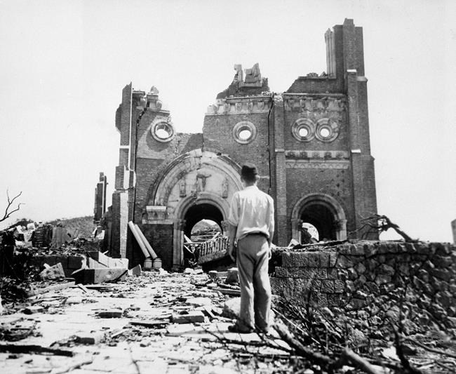 In this Sept. 13, 1945, file photo, the Urakami Catholic Cathedral in Nagasaki, Japan, stands waste in the aftermath of the detonation of the atom bomb over a month ago over this city. (AP Photo/Stanley Troutman, Pool, File)