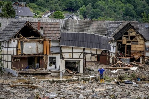 Destroyed houses are seen in Schuld, Germany, Thursday, July 15, 2021. Due to heavy rain falls the Ahr river dramatically went over the banks the evening before. People have died and dozens of people are missing in Germany after heavy flooding turned streams and streets into raging torrents, sweeping away cars and causing some buildings to collapse. (AP Photo/Michael Probst)