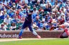 Chicago Cubs' Joc Pederson (24) hits a three-run double against the St. Louis Cardinals during the first inning of a baseball game, Friday, July 9, 2021, in Chicago. (AP Photo/David Banks)