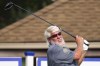 John Daly watches his drive on the fifth hole during the first round of the Barbasol Championship golf tournament on Thursday, July 15, 2021, at Keene Trace Golf Club in Nicholasville, Ky. (Michael Clubb/Courier Journal via AP)