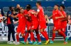 Canada midfielder Stephen Eustaquio (7) is congratulated by teammates after scoring on a penalty kick during the first half of a CONCACAF Gold Cup soccer match against Haiti in Kansas City, Kan., Thursday, July 15, 2021. (AP Photo/Colin E. Braley)
