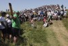 Northern Ireland's Rory McIlroy plays out of the rough on the 11 hole during the third round of the British Open Golf Championship at Royal St George's golf course Sandwich, England, Saturday, July 17, 2021. (AP Photo/Ian Walton)