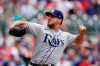 Tampa Bay Rays starting pitcher Rich Hill delivers against an Atlanta Braves batter in the first inning of a baseball game Sunday, July 18, 2021, in Atlanta. (AP Photo/John Bazemore)