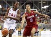 Canada forward Miranda Ayim battles for the ball against United States guard Shatori Walker (9) during first half gold medal action at the Pan American Games in Toronto on Monday, July 20, 2015. Women's basketball player Miranda Ayim and men’s rugby sevens player Nathan Hirayama have been named Canada's flag-bearers for the opening ceremony of the Tokyo Olympics. THE CANADIAN PRESS/Nathan Denette