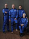 In this photo provided by Blue Origin, from left to right: Mark Bezos, brother of Jeff Bezos;Jeff Bezos, founder of Amazon and space tourism company Blue Origin; Oliver Daemen, of the Netherlands;and Wally Funk, aviation pioneer from Texas, pose for a photo. (Blue Origin via AP)