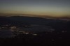 Looking high above the small town of Osoyoos B.C. in the southern Okanagan the glow of smoke and fire illuminates the night sky on Thursday July 19, 2018. At least 160 properties have been ordered to evacuate as an aggressive wildfire burns in the south Okanagan. THE CANADIAN PRESS/Jeff Bassett