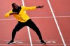 Jamaica's Usain Bolt performs his trademark pose during a victory lap to mark his athletics career during the World Athletics Championships in London Sunday, Aug. 13, 2017. THE CANADIAN PRESS/AP/Martin Meissner