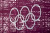 The Olympic rings are set against a lattice work of pipes supporting a grandstand at the skateboarding arena for the 2020 Summer Olympics, Tuesday, July 20, 2021, at the Ariake Urban Sports Park in Tokyo. THE CANADIAN PRESS/AP/Charlie Riedel